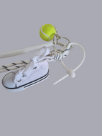 Grigri converse et sa balle de tenis