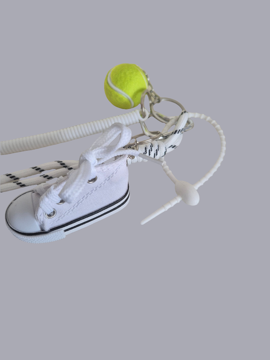 Grigri converse et sa balle de tenis