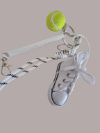 Grigri converse et sa balle de tenis