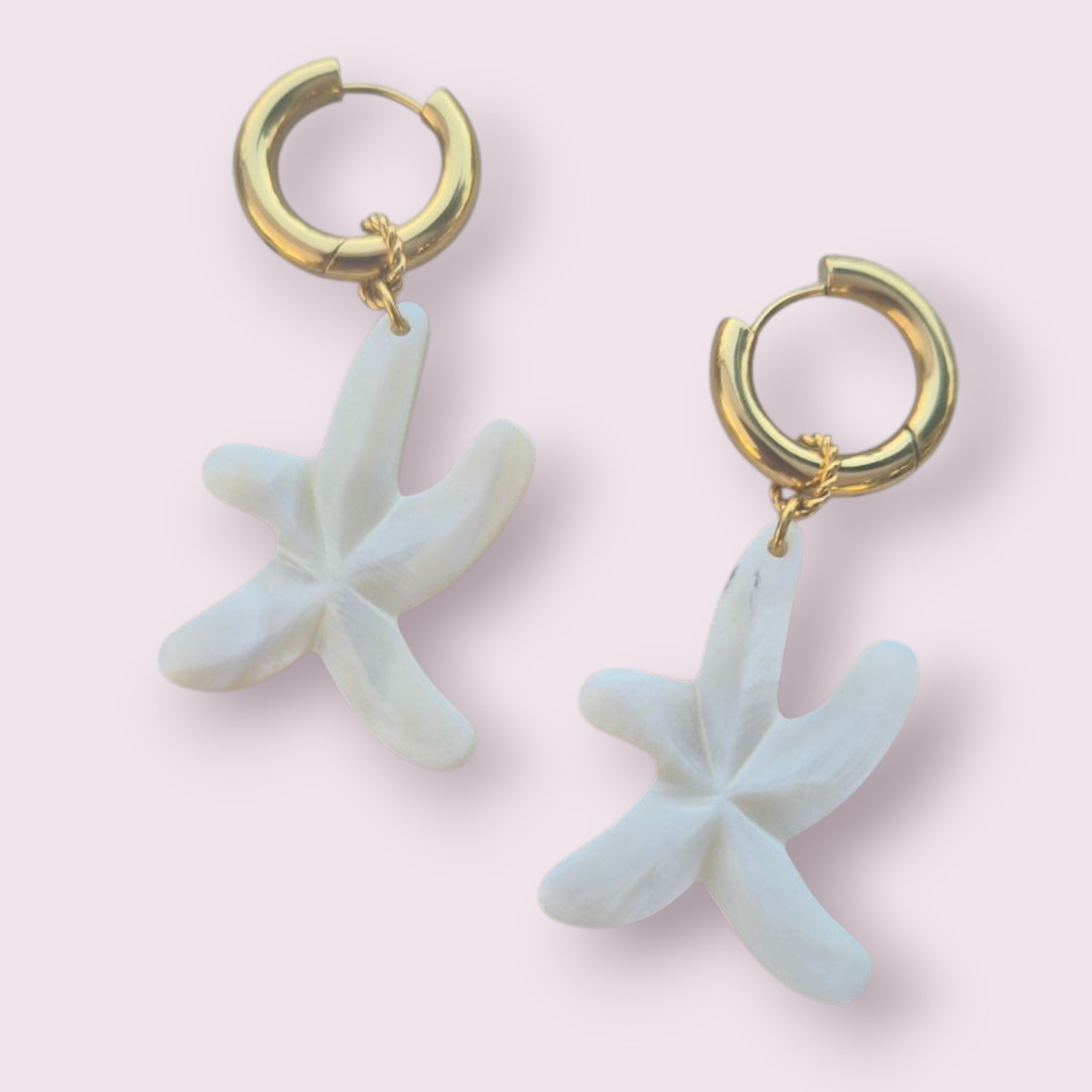 Boucle d'oreille étoile blanche